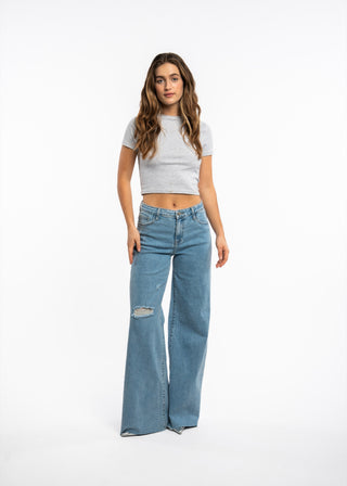 AMIRA - Wide fit ripped knee jeans