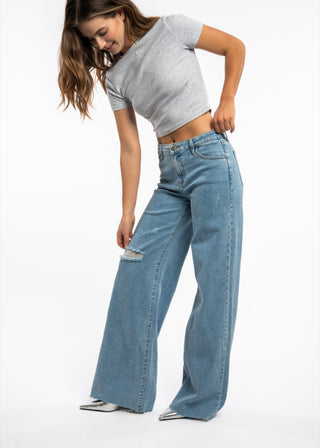 AMIRA - Jean wide fit déchiré genoux