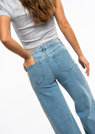 AMIRA - Jean wide fit déchiré genoux
