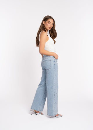 DAWN - Blue jeans with studded eyelets