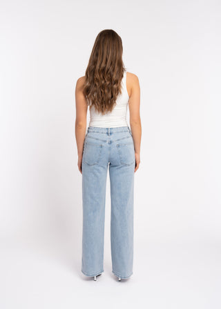 DAWN - Blue jeans with studded eyelets