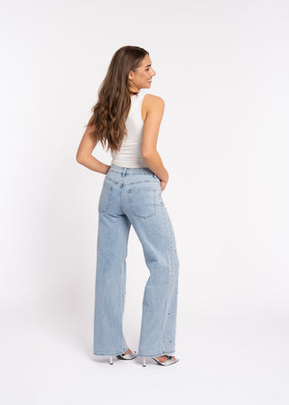 DAWN - Blue jeans with studded eyelets