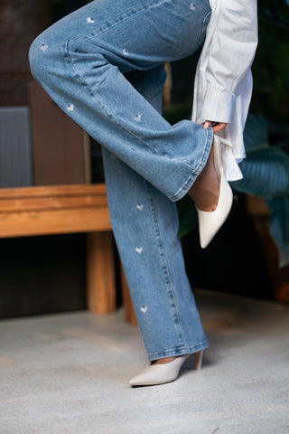 SABINE - Blue denim jeans embroidered with white hearts